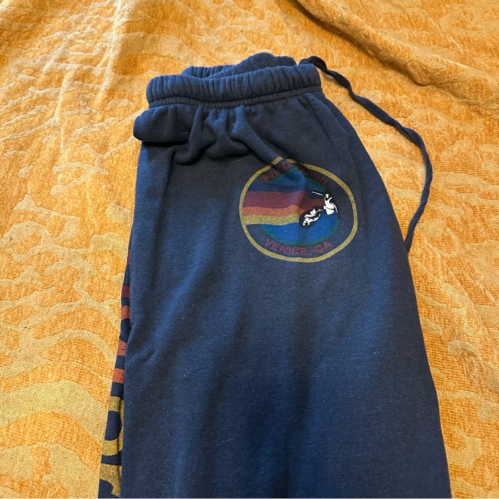 Aviator Nation Blue Track Pants with Rainbow Design